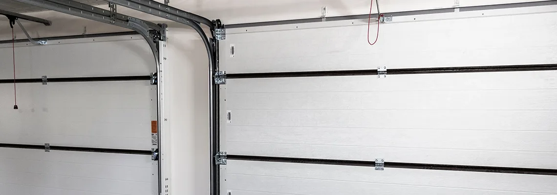 Fix Folding Garage Door Jerking in Palm Coast, Florida